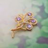 Picture of Vintage Swirl Brooch Gold Plated with Purple CZ