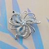 Picture of Small Spiral Bloom Flower Brooch Rhodium Plated