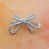 Picture of Small Double Ribbon Bow Brooch Rhodium Plated