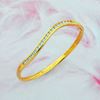 Picture of Wavy Half Eternity Bangle Gold Plated with Channel Pave CZ