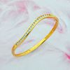 Picture of Wavy Half Eternity Bangle Gold Plated