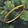 Picture of Criss Cross Rope Bangle Gold Plated