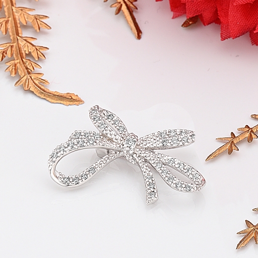 rhodium plated bow brooch