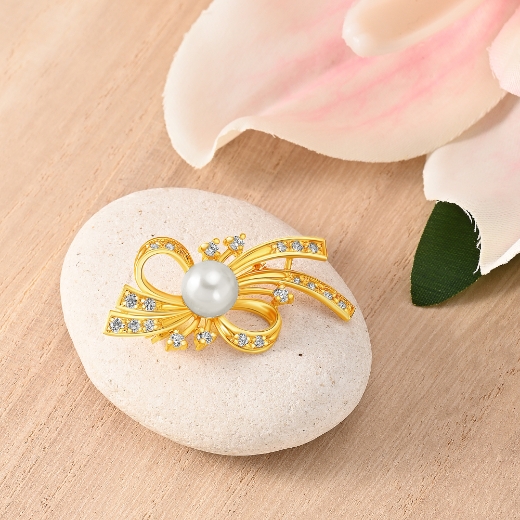 bow brooch with pearl