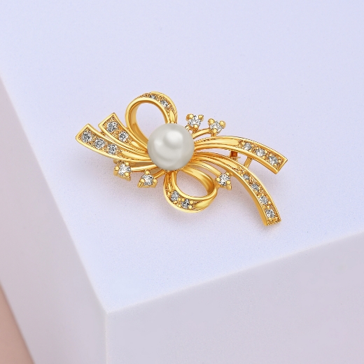 gold plated bow brooch pearl