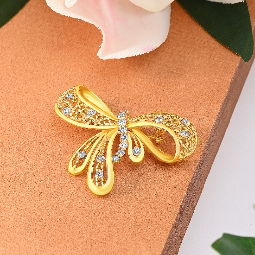 gold plated bow brooch