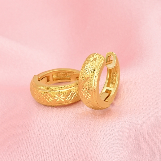 gold plated textured star earrings